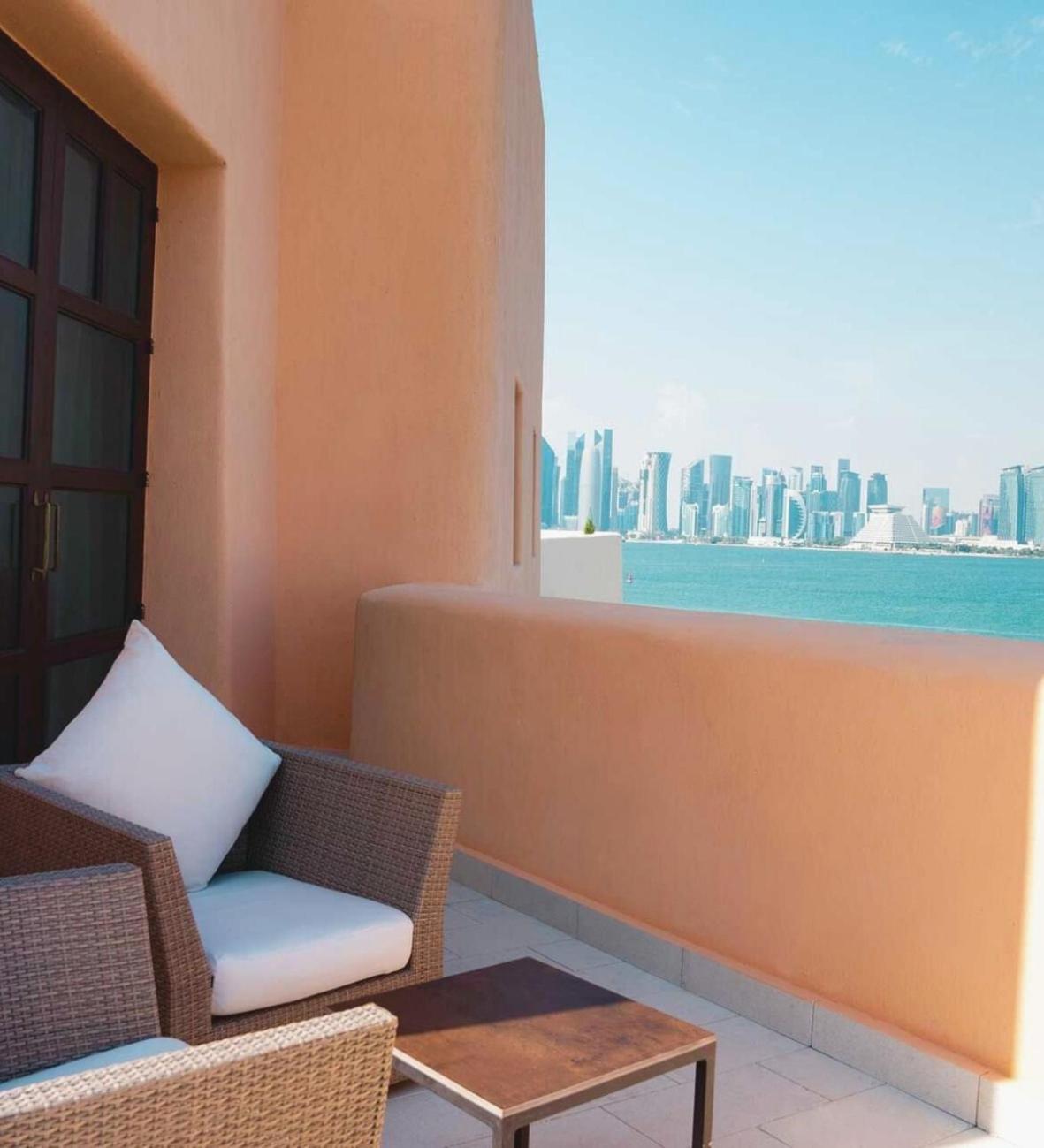 Mina Hotel And Residences By The Torch Doha Exteriör bild View of the Doha skyline from the hotel