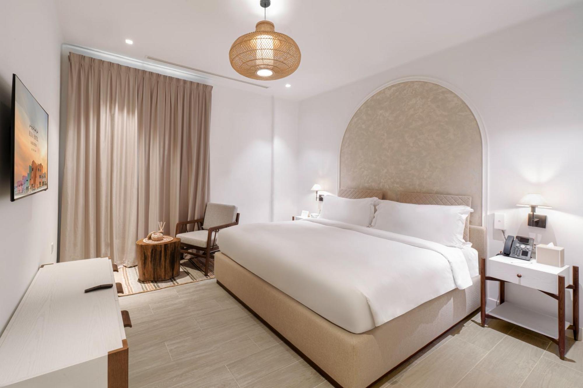 Mina Hotel And Residences By The Torch Doha Exteriör bild Deluxe room