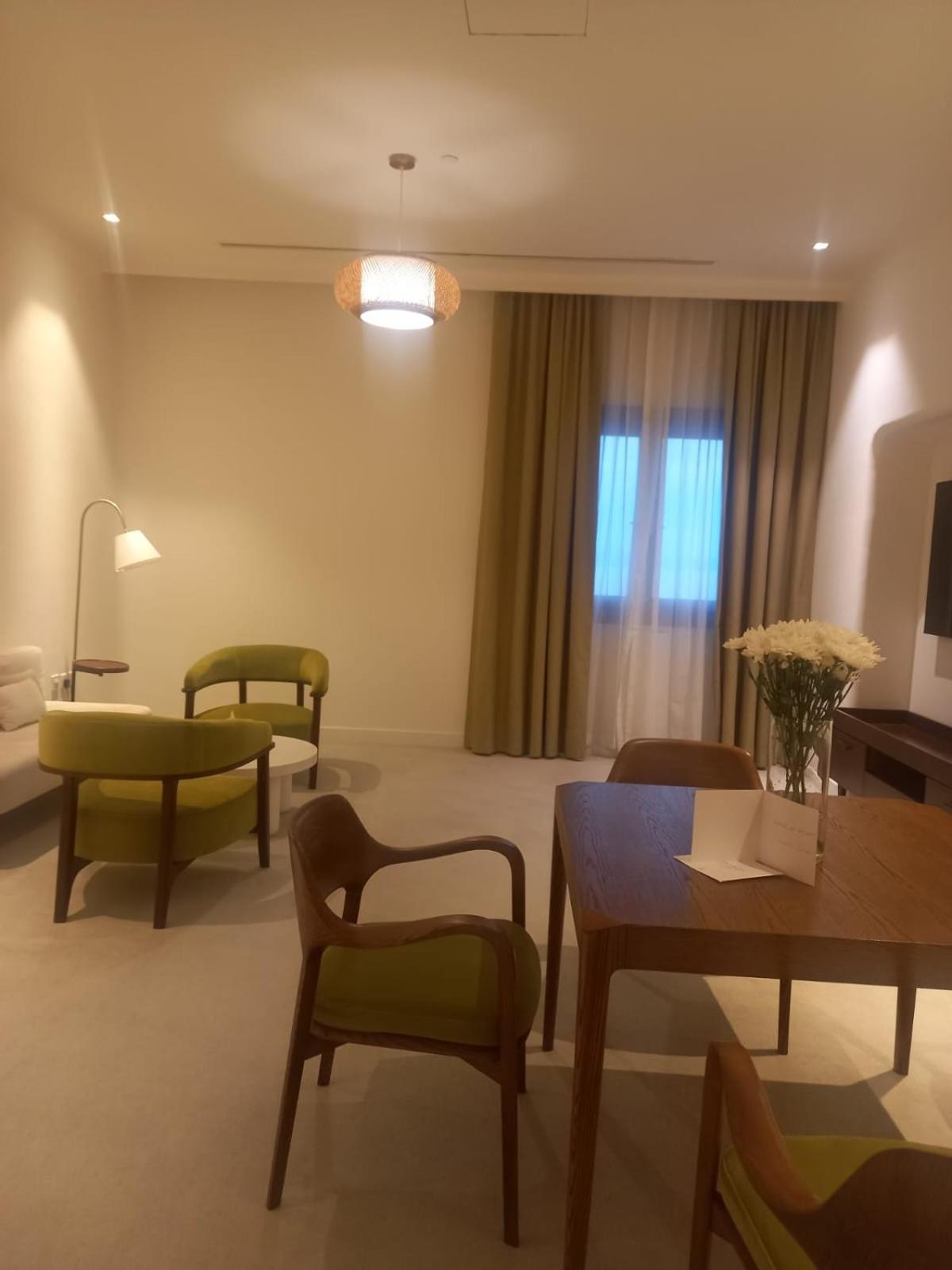 Mina Hotel And Residences By The Torch Doha Exteriör bild A room at the hotel